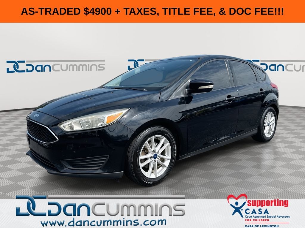 2016 Ford Focus SE in Shadow Black — front three-quarter view