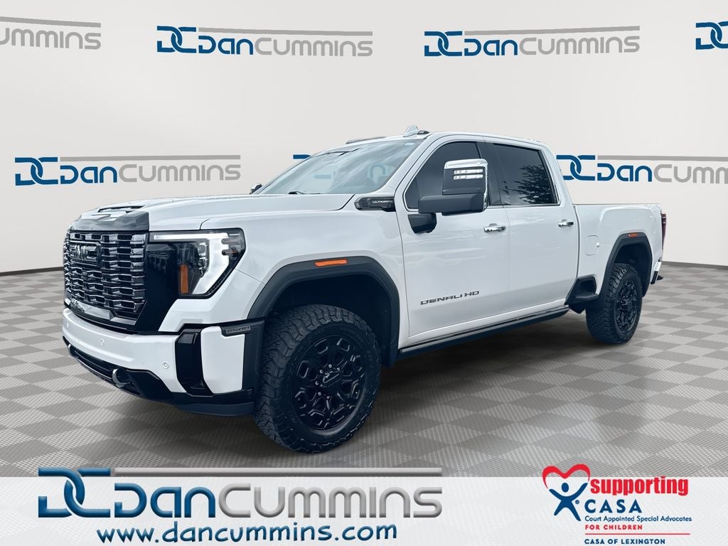 2025 GMC Sierra 2500HD Denali Ultimate in White Frost Tricoat — front three-quarter view