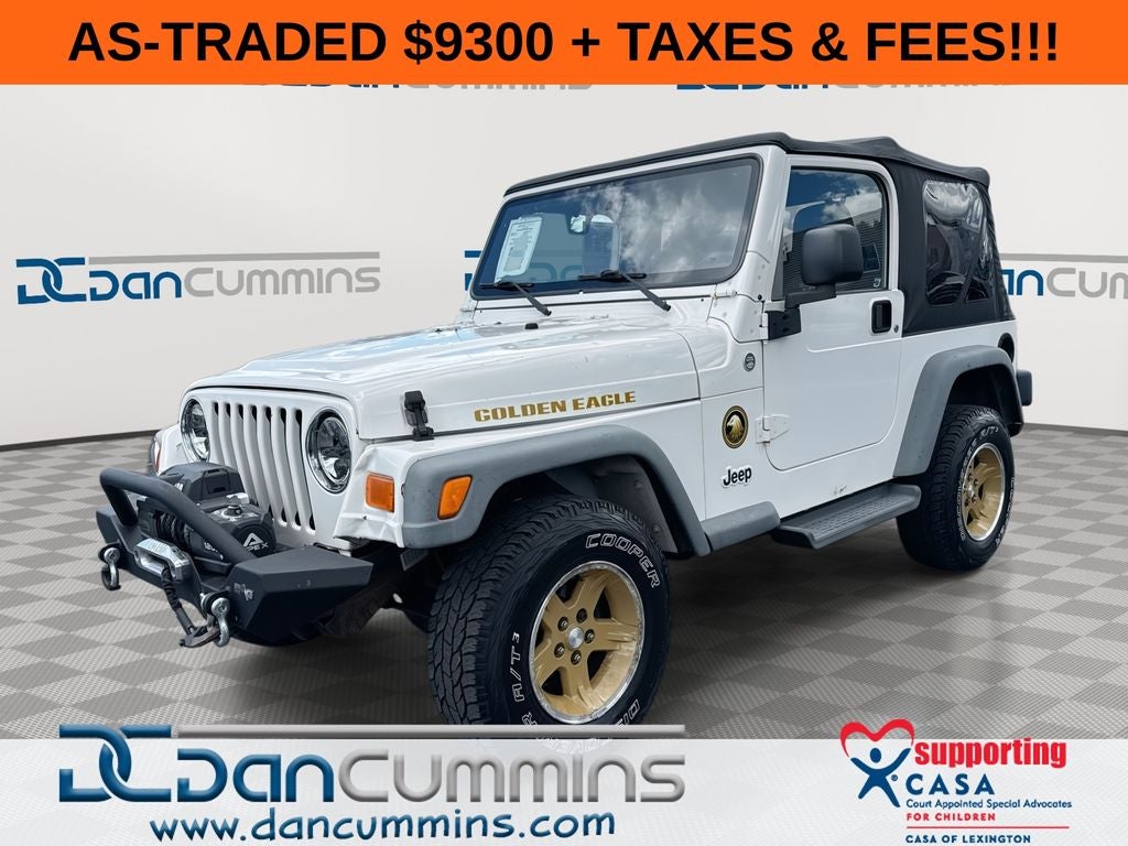 2006 Jeep Wrangler Sport in Stone White — front three-quarter view
