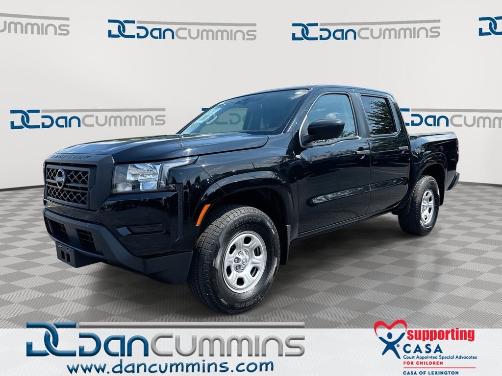 2022 Nissan Frontier S in Super Black — front three-quarter view