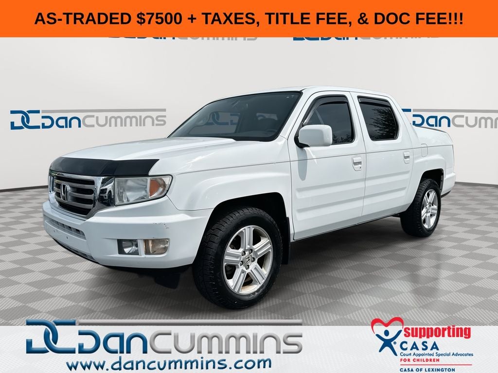 2013 Honda Ridgeline RTL in White — front three-quarter view