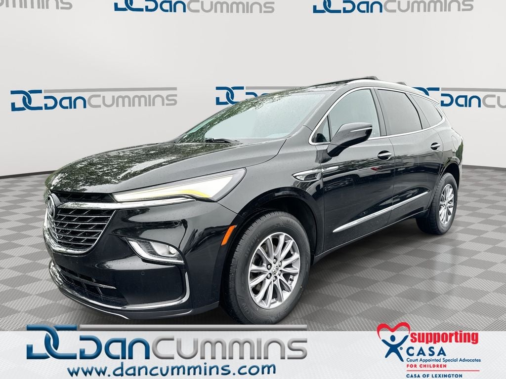 2023 Buick Enclave Essence in Ebony Twilight Metallic — front three-quarter view