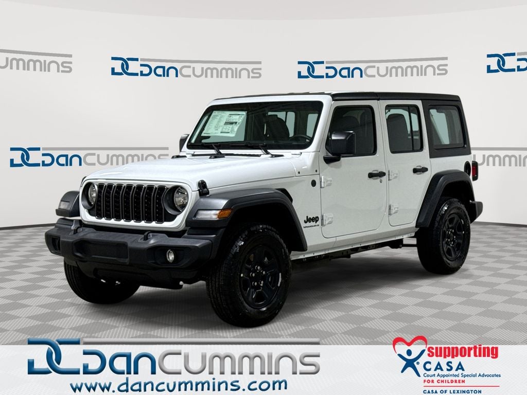 2026 Jeep Wrangler Sport in Bright White Clear-Coat Exterior Paint — front three-quarter view