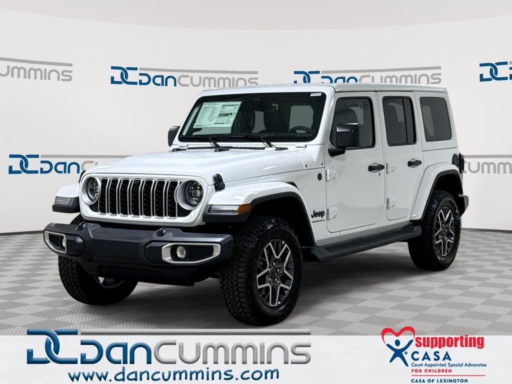 2026 Jeep Wrangler Sahara in Bright White Clear-Coat Exterior Paint — front three-quarter view