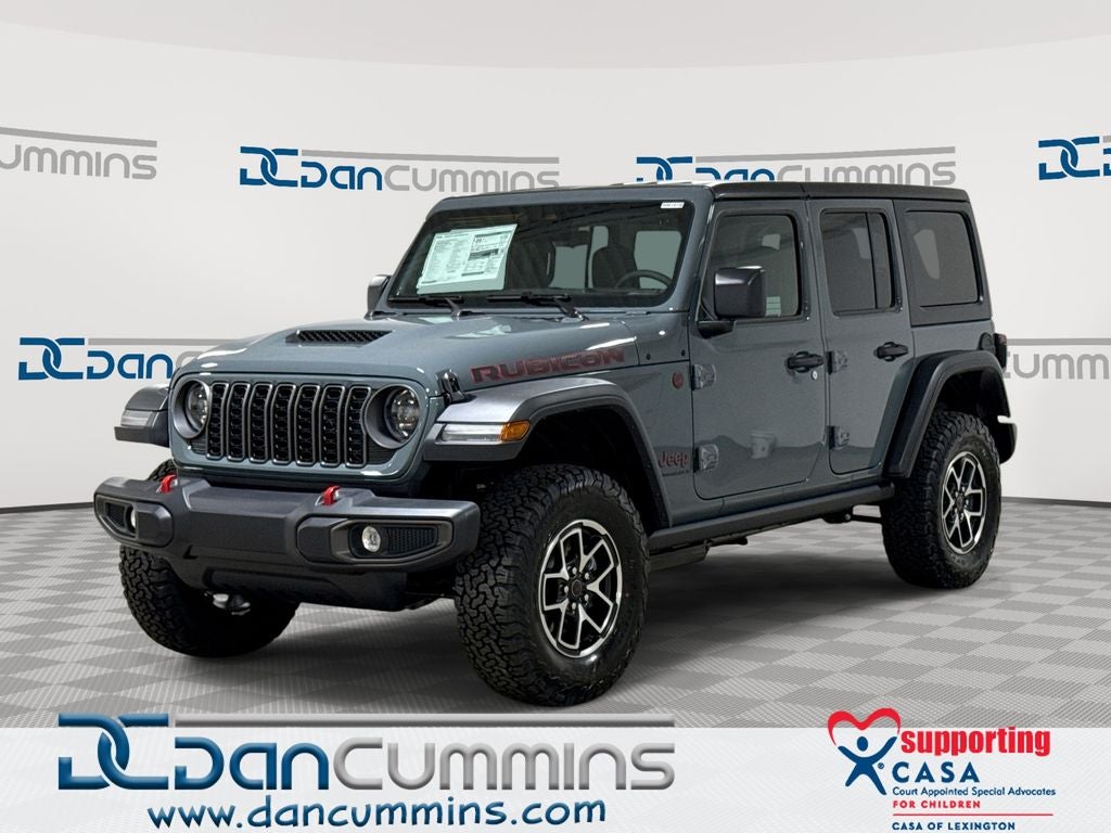 2026 Jeep Wrangler Rubicon in Anvil Clear-Coat Exterior Paint — front three-quarter view
