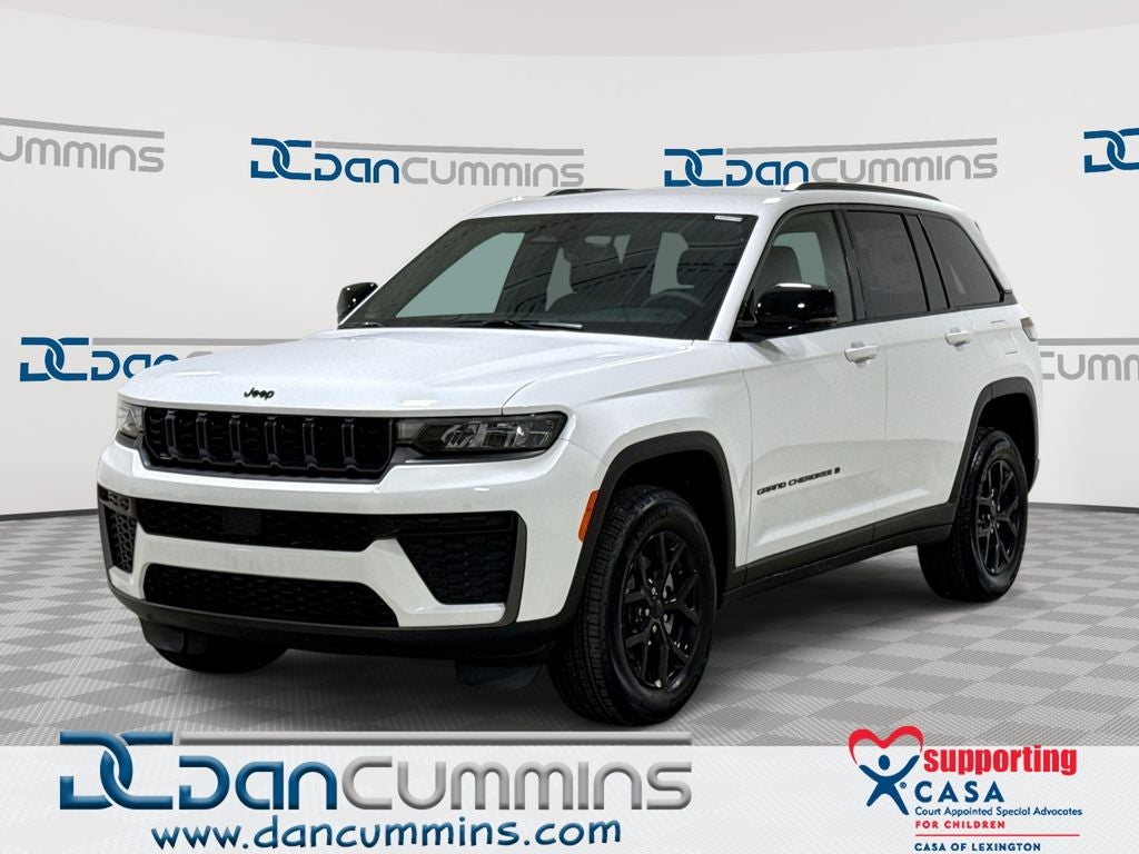 2026 Jeep Grand Cherokee Altitude in Bright White Clear-Coat Exterior Paint — front three-quarter view