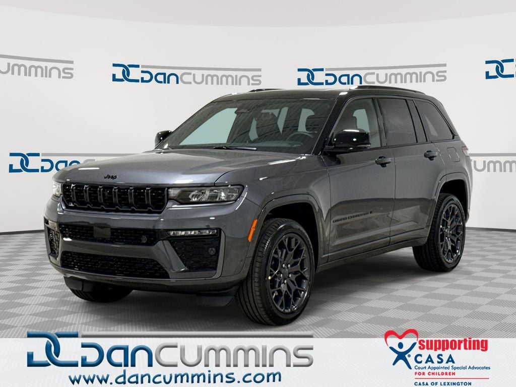 2026 Jeep Grand Cherokee Summit in Baltic Gray Metallic Clear-Coat Exterior Paint — front three-quarter view