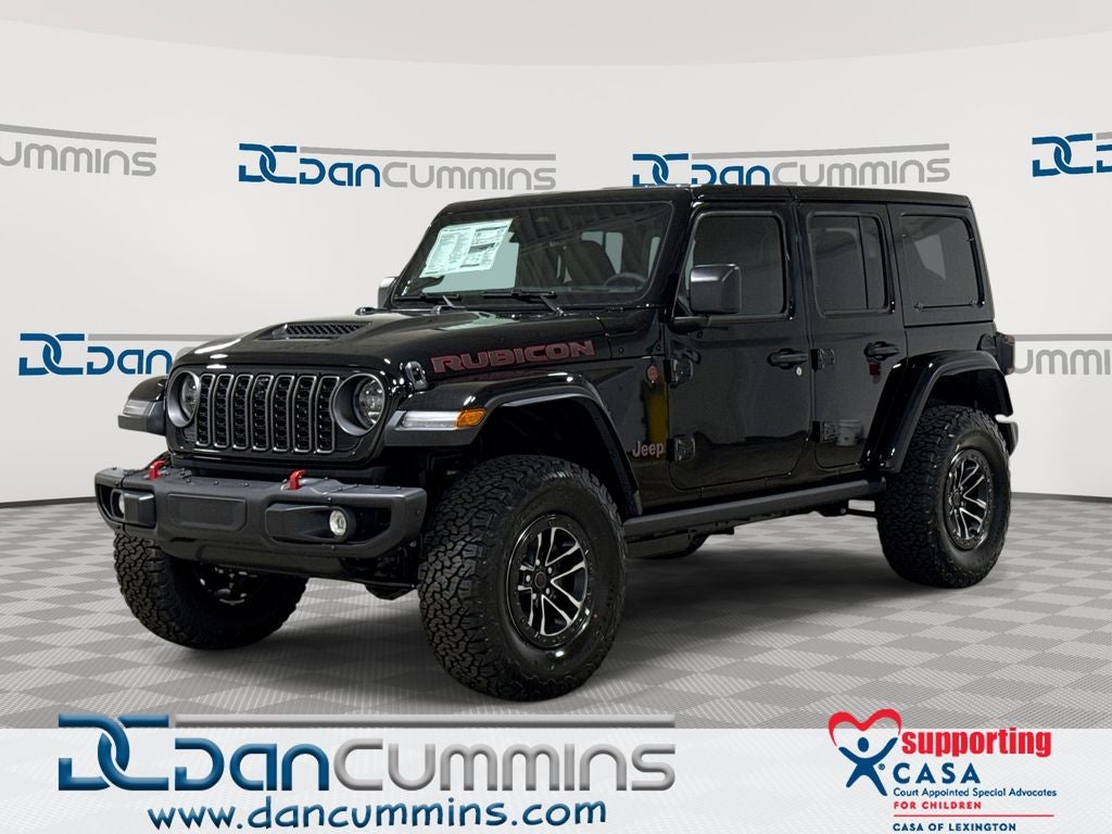 2026 Jeep Wrangler Rubicon X in Black Clear-Coat Exterior Paint — front three-quarter view