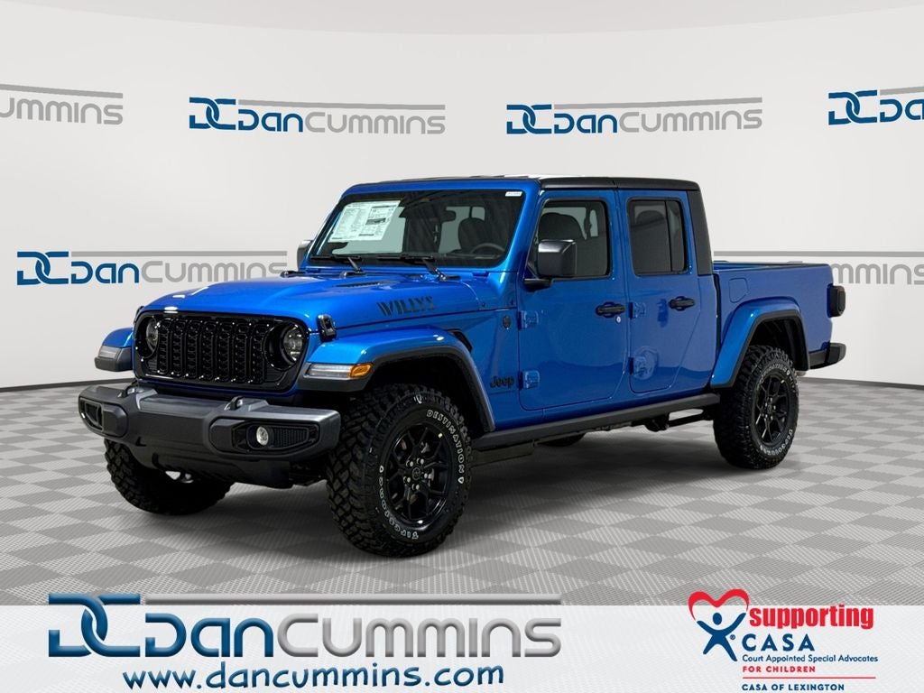 2026 Jeep Gladiator Willys in Hydro Blue Pearl-Coat Exterior Paint — front three-quarter view
