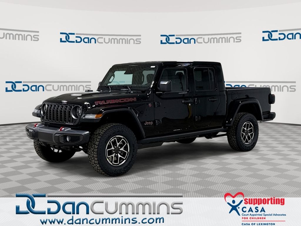 2026 Jeep Gladiator Rubicon in Black Clear-Coat Exterior Paint — front three-quarter view