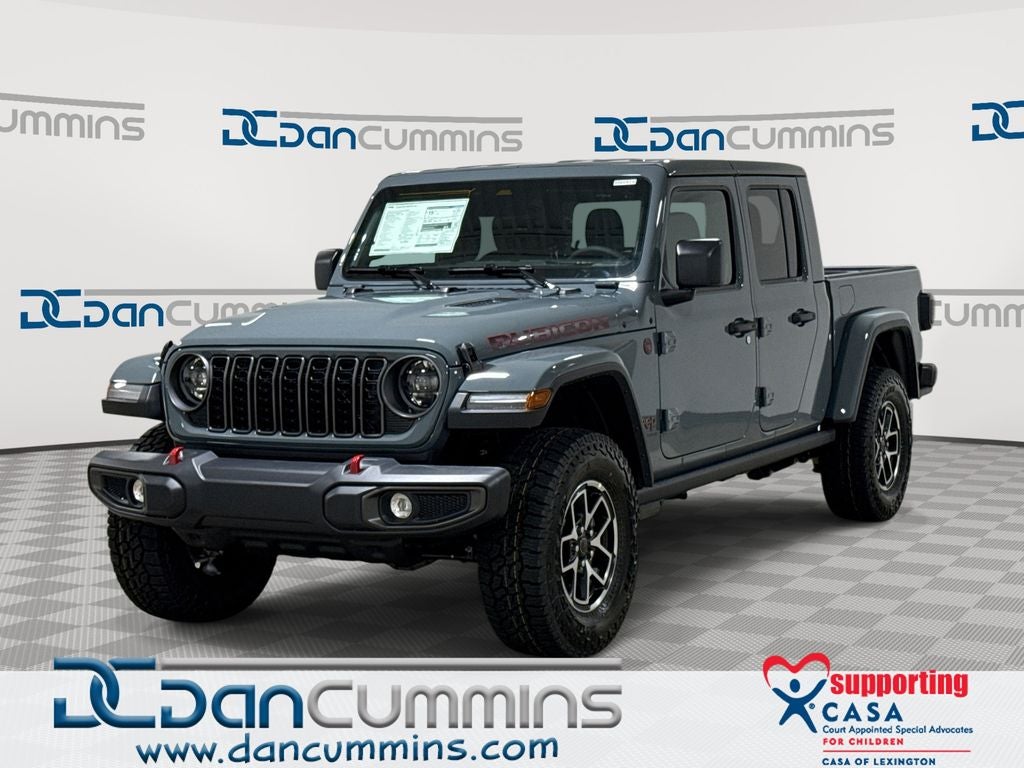 2026 Jeep Gladiator Rubicon in Anvil Clear-Coat Exterior Paint — front three-quarter view