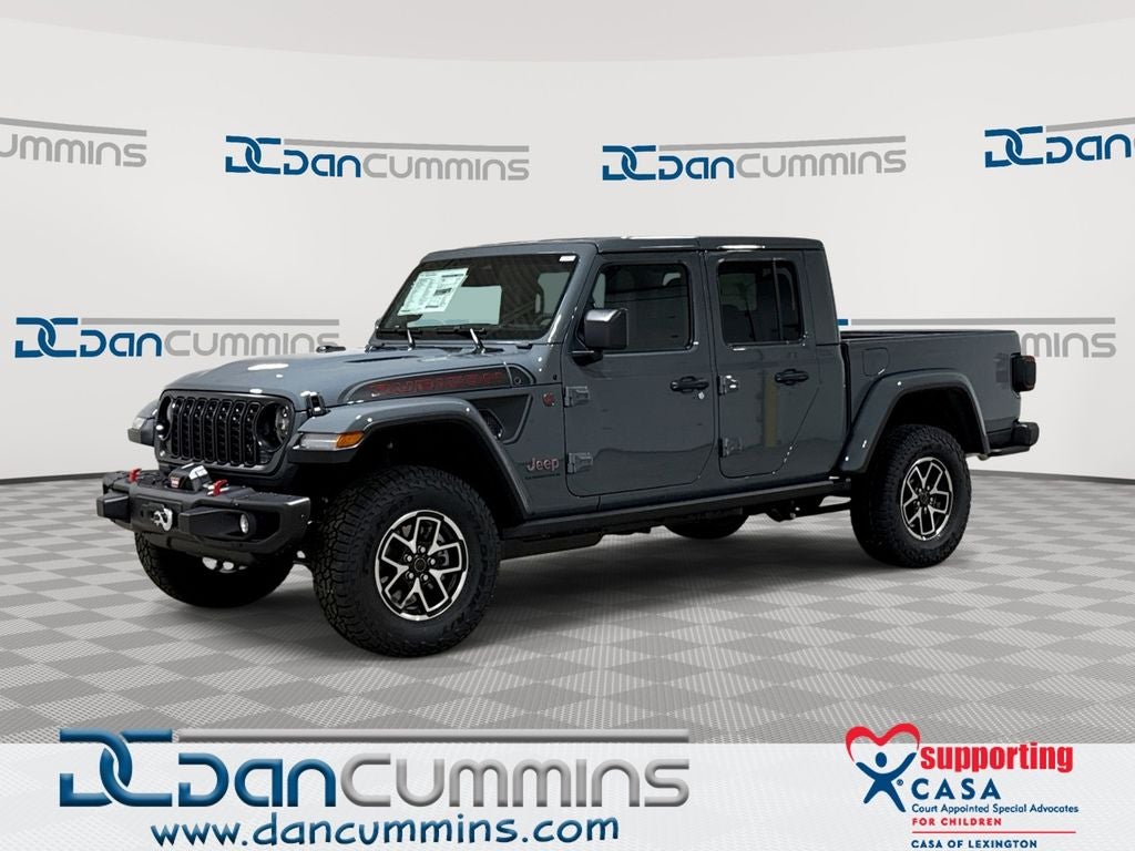 2026 Jeep Gladiator Shadow Ops in Anvil Clear-Coat Exterior Paint — front three-quarter view