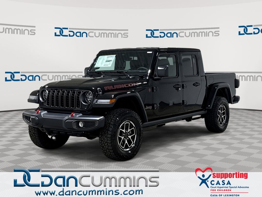2026 Jeep Gladiator Rubicon in Black Clear-Coat Exterior Paint — front three-quarter view