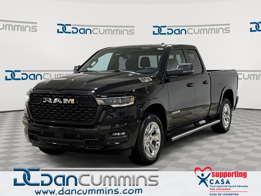 2026 RAM 1500 Big Horn/Lone Star in Diamond Black Crystal Pearl-Coat Exterior Paint — front three-quarter view