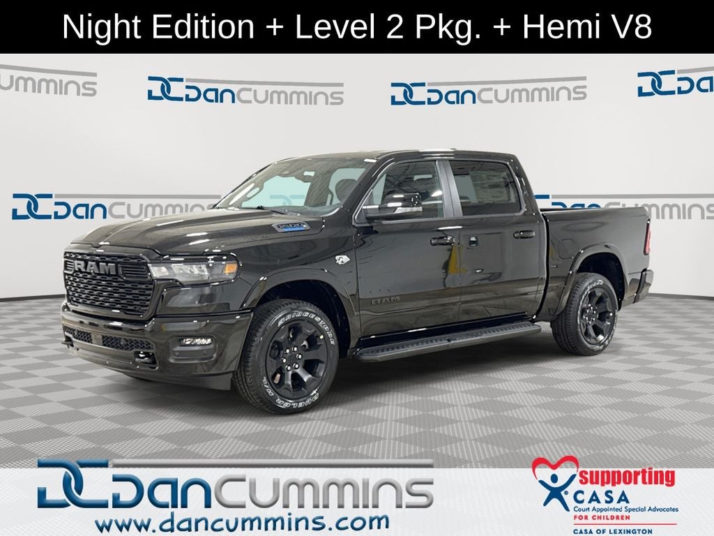 2026 RAM 1500 Big Horn/Lone Star in Diamond Black Crystal Pearl-Coat Exterior Paint — front three-quarter view