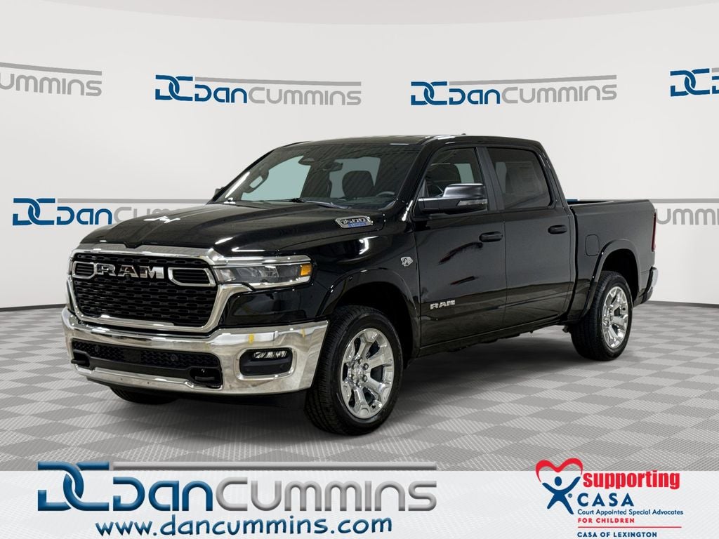 2026 RAM 1500 Big Horn/Lone Star in Diamond Black Crystal Pearl-Coat Exterior Paint — front three-quarter view