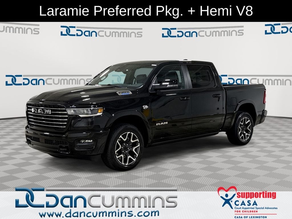 2026 RAM 1500 Laramie in Diamond Black Crystal Pearl-Coat Exterior Paint — front three-quarter view