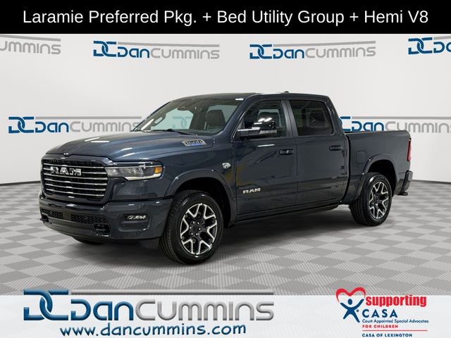 2026 RAM 1500 Laramie in Forged Blue Metallic Exterior Paint — front three-quarter view