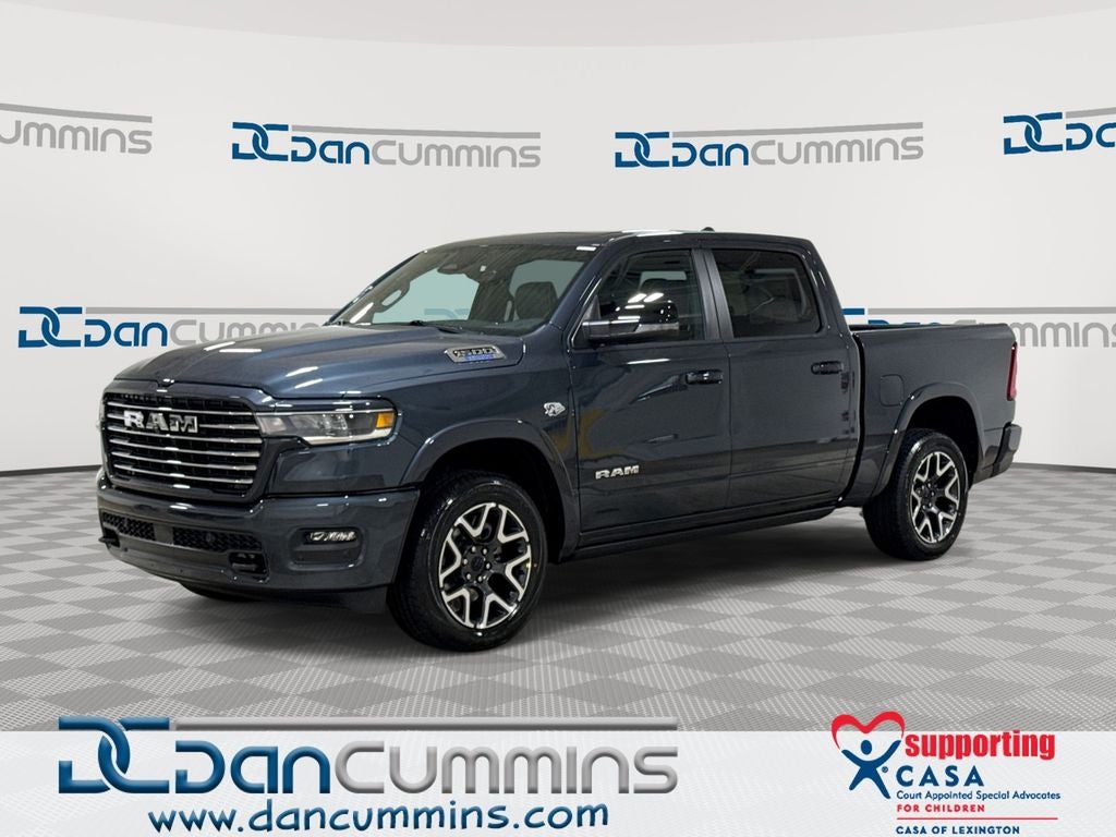 2026 RAM 1500 Laramie in Forged Blue Metallic Exterior Paint — front three-quarter view