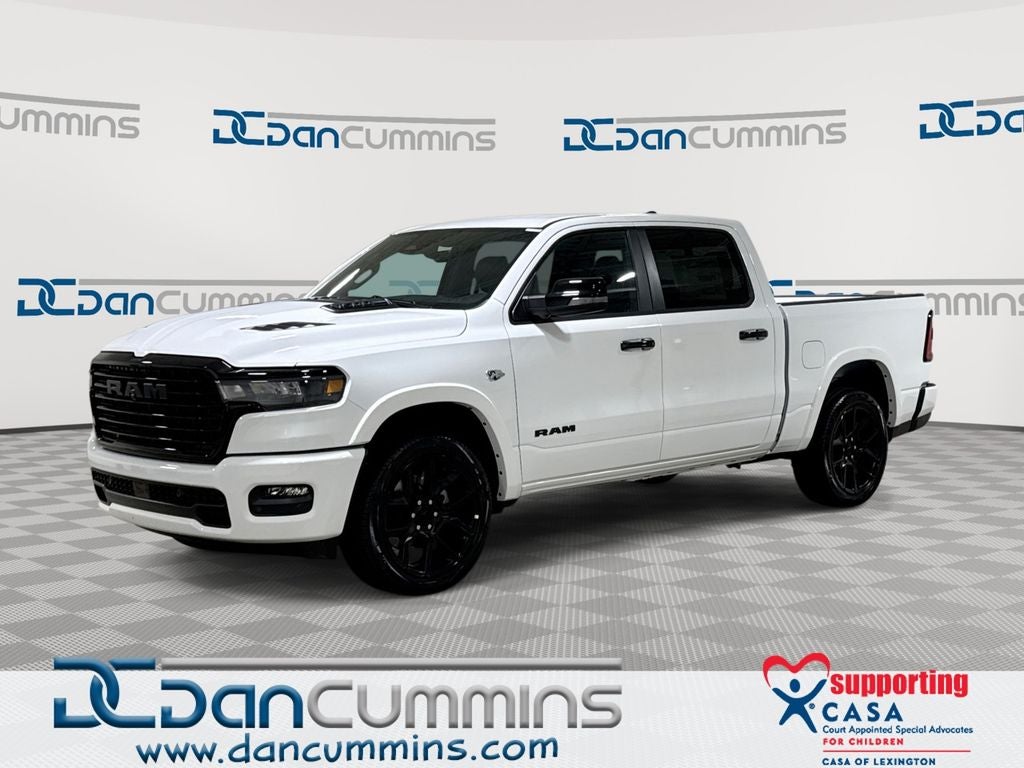 2026 RAM 1500 Laramie in Bright White Clear-Coat Exterior Paint — front three-quarter view