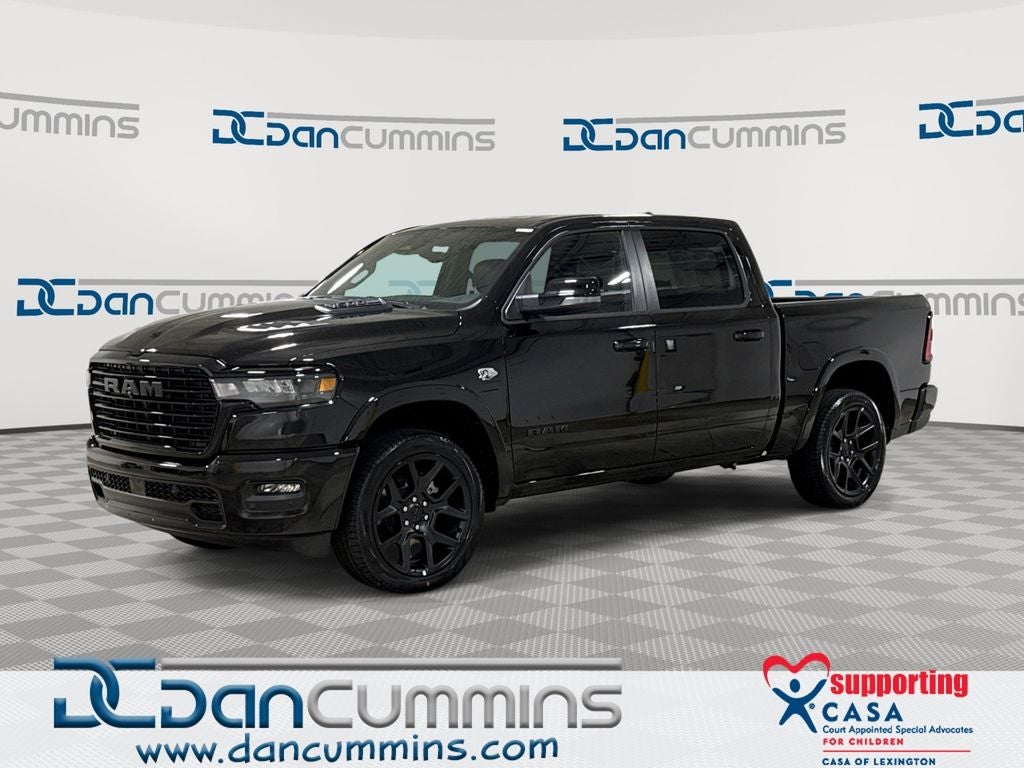 2026 RAM 1500 Laramie in Diamond Black Crystal Pearl-Coat Exterior Paint — front three-quarter view