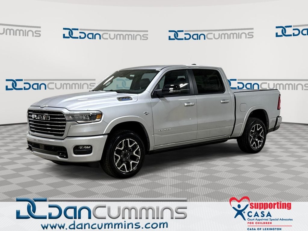 2026 RAM 1500 Laramie in Silver Zynith Exterior Paint — front three-quarter view