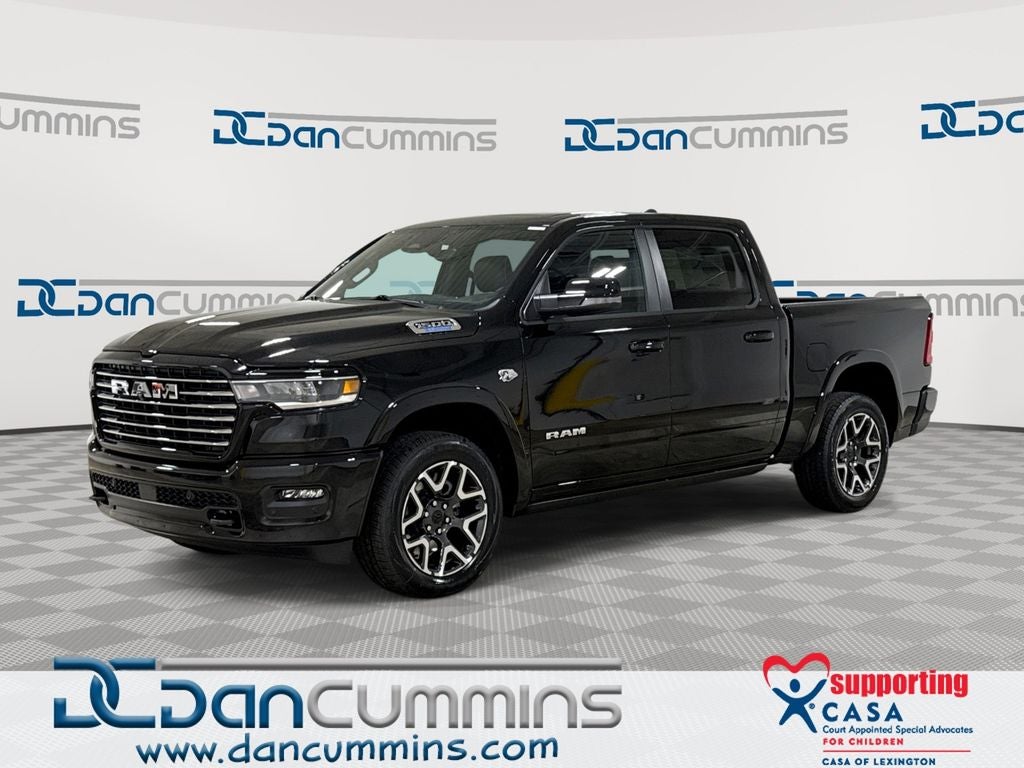 2026 RAM 1500 Laramie in Diamond Black Crystal Pearl-Coat Exterior Paint — front three-quarter view