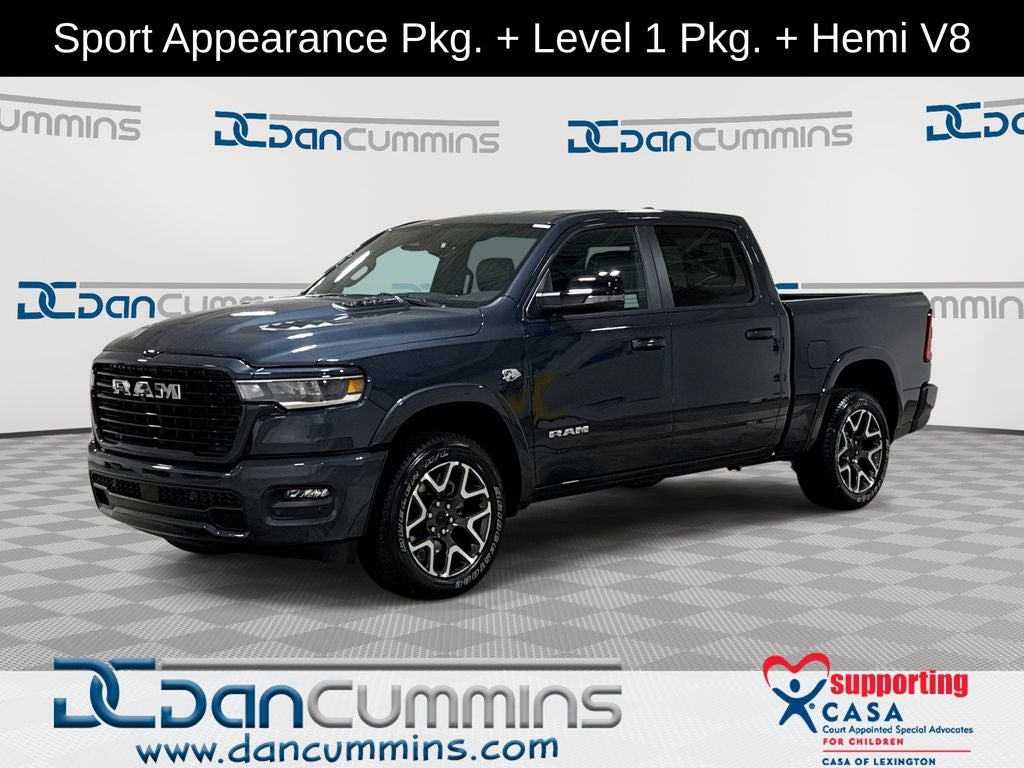 2026 RAM 1500 Laramie in Forged Blue Metallic Exterior Paint — front three-quarter view