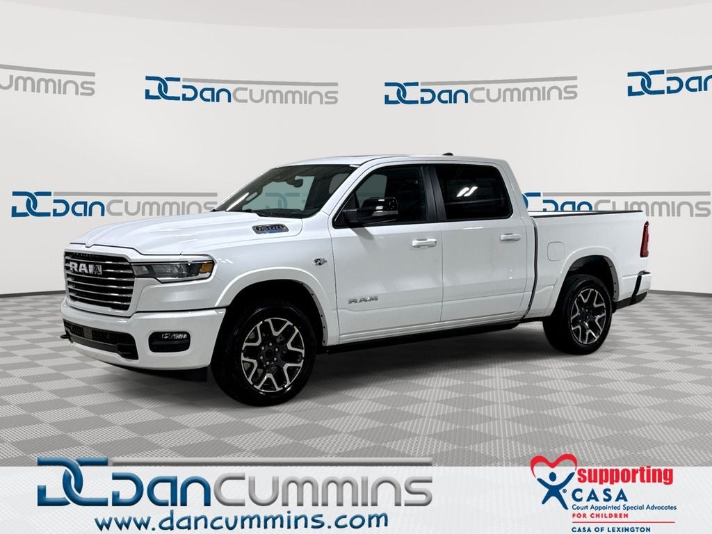 2026 RAM 1500 Laramie in Bright White Clear-Coat Exterior Paint — front three-quarter view