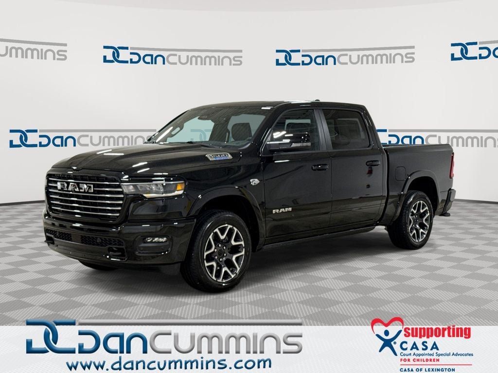 2026 RAM 1500 Laramie in Diamond Black Crystal Pearl-Coat Exterior Paint — front three-quarter view