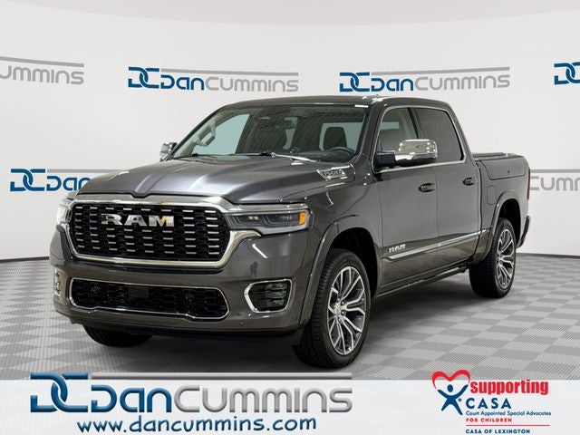 2026 RAM 1500 Tungsten in Granite Crystal Metallic Clear-Coat Exterior Paint — front three-quarter view
