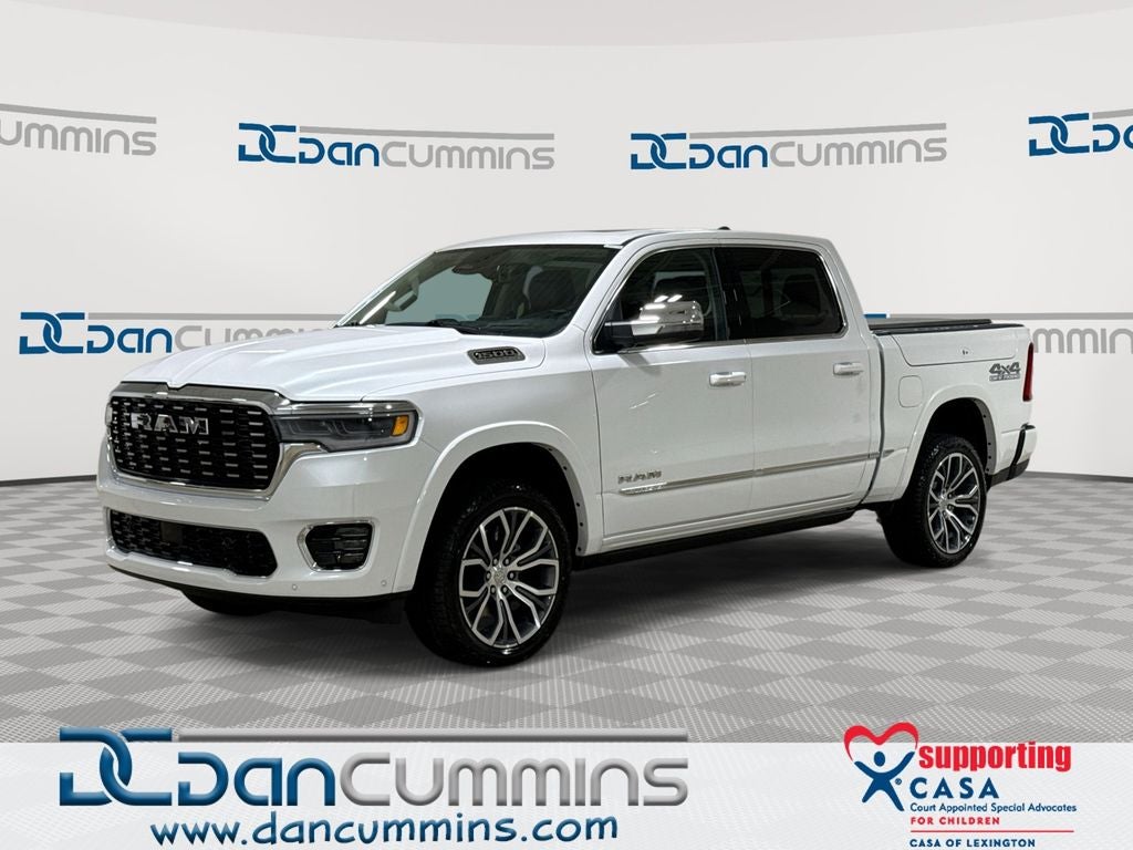 2026 RAM 1500 Tungsten in Ivory White Tri-Coat Pearl-Coat Exterior Paint — front three-quarter view