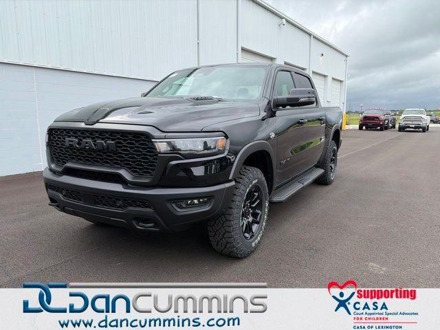 2026 RAM 1500 Rebel in Diamond Black Crystal Pearl-Coat Exterior Paint — front three-quarter view