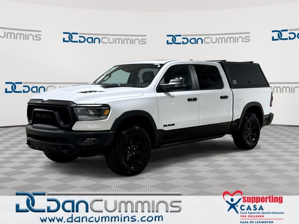 2024 RAM 1500 Rebel in Bright White Clearcoat — front three-quarter view