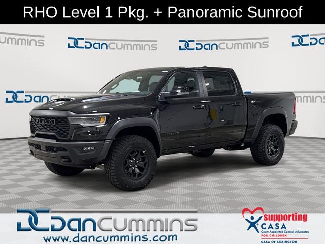 2026 RAM 1500 RHO in Diamond Black Crystal Pearl-Coat Exterior Paint — front three-quarter view