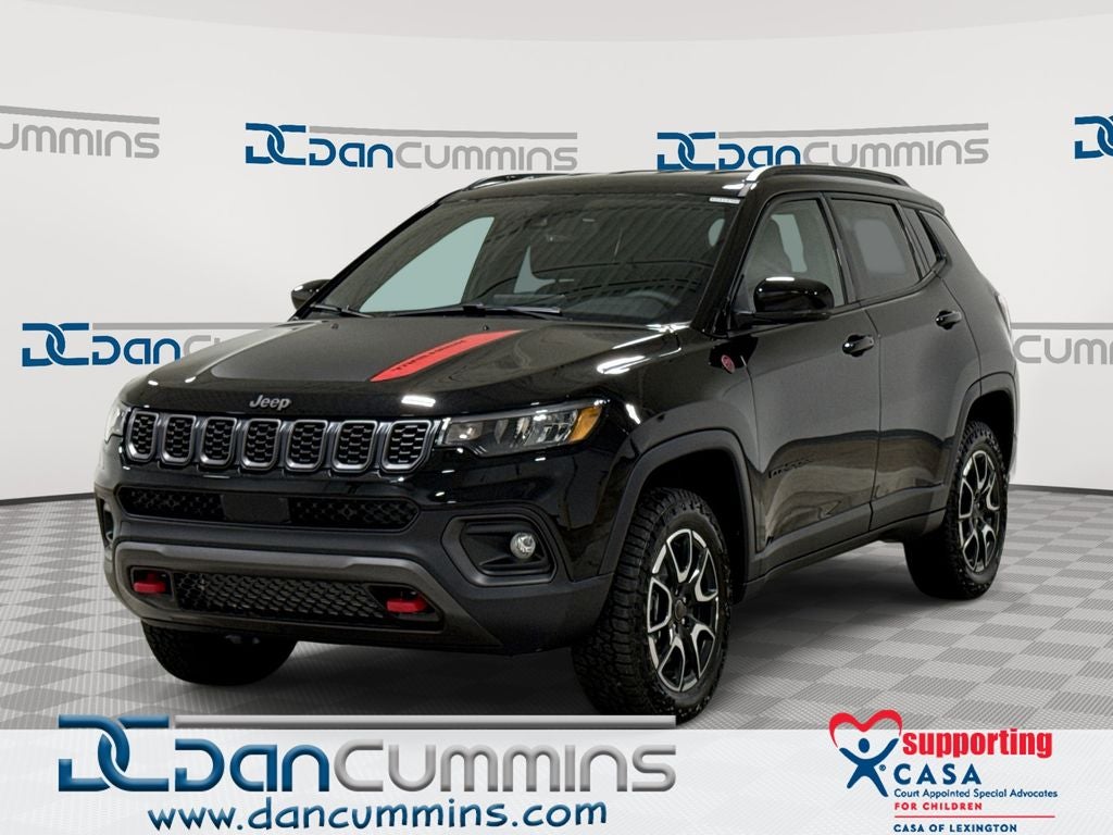 2026 Jeep Compass Trailhawk in Diamond Black Crystal Pearl-Coat Exterior Paint — front three-quarter view