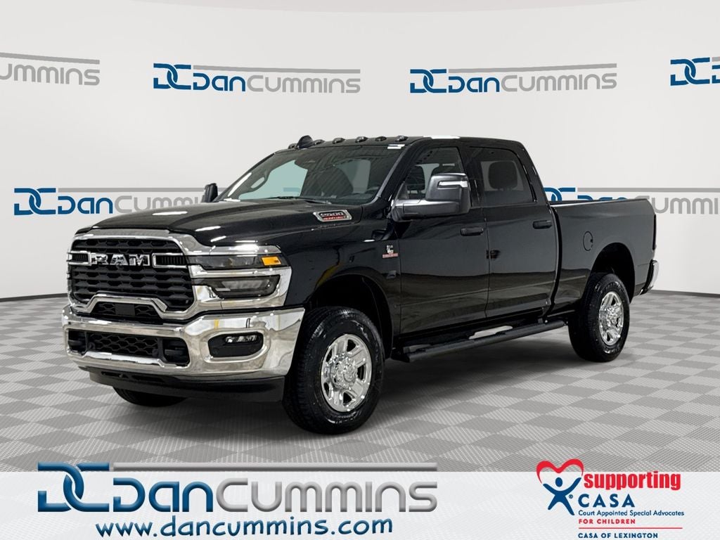 2026 RAM 2500 Tradesman in Diamond Black Crystal Pearl-Coat Exterior Paint — front three-quarter view