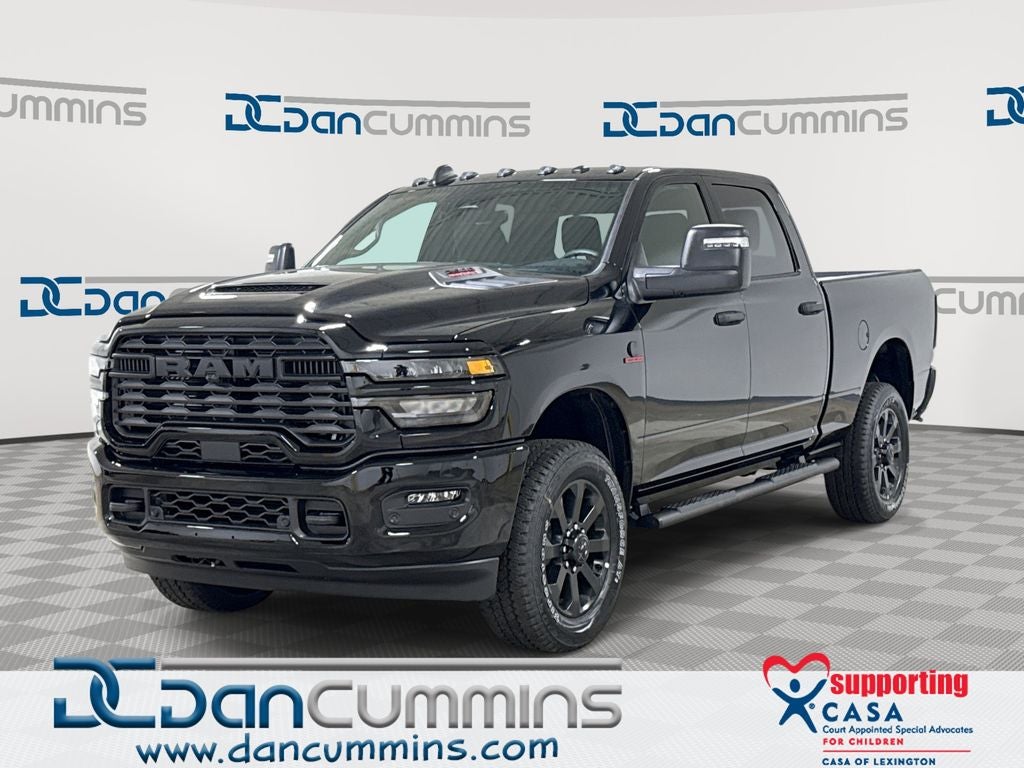 2026 RAM 2500 Tradesman in Diamond Black Crystal Pearl-Coat Exterior Paint — front three-quarter view
