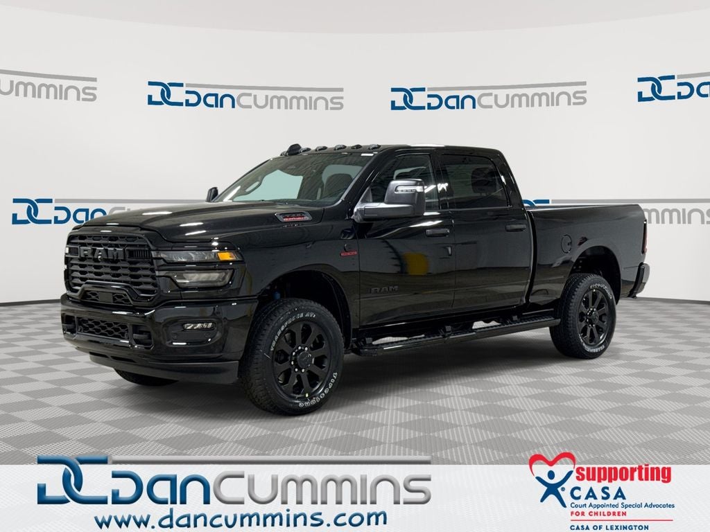 2026 RAM 2500 Big Horn in Diamond Black Crystal Pearl-Coat Exterior Paint — front three-quarter view