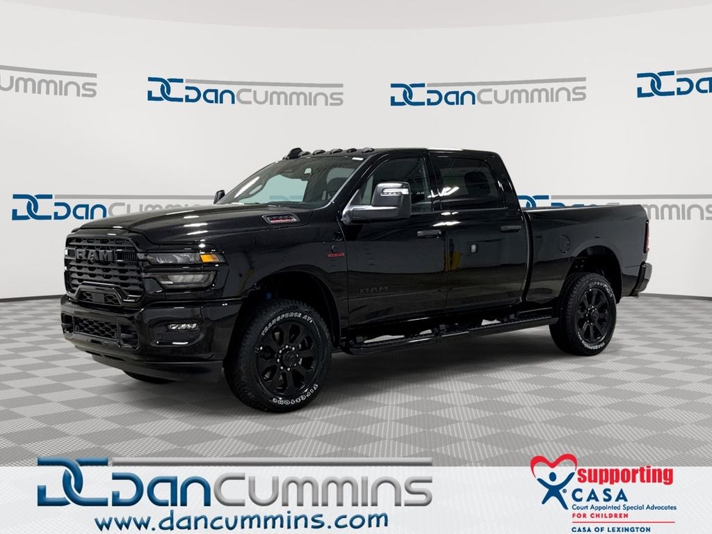 2026 RAM 2500 Big Horn in Diamond Black Crystal Pearl-Coat Exterior Paint — front three-quarter view