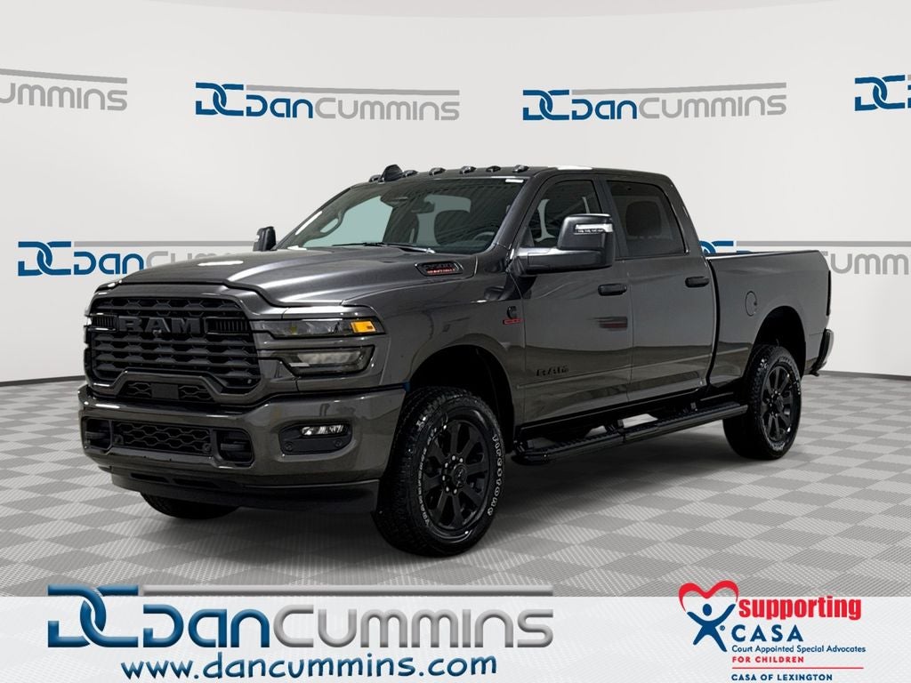 2026 RAM 2500 Big Horn in Granite Crystal Metallic Clear-Coat Exterior Paint — front three-quarter view