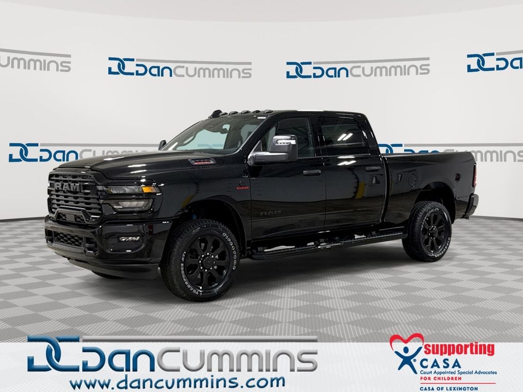 2026 RAM 2500 Big Horn in Diamond Black Crystal Pearl-Coat Exterior Paint — front three-quarter view