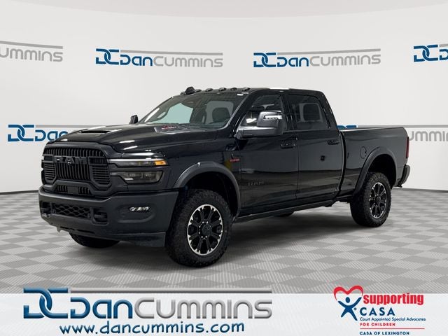 2026 RAM 2500 Rebel in Diamond Black Crystal Pearl-Coat Exterior Paint — front three-quarter view