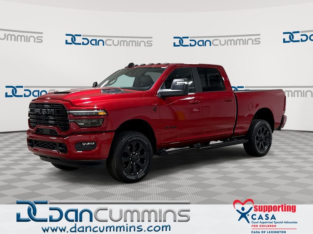 2026 RAM 2500 Laramie in Molten Red Pearl-Coat Exterior Paint — front three-quarter view