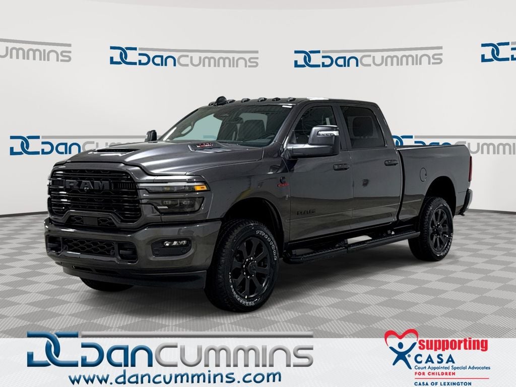 2026 RAM 2500 Laramie in Granite Crystal Metallic Clear-Coat Exterior Paint — front three-quarter view