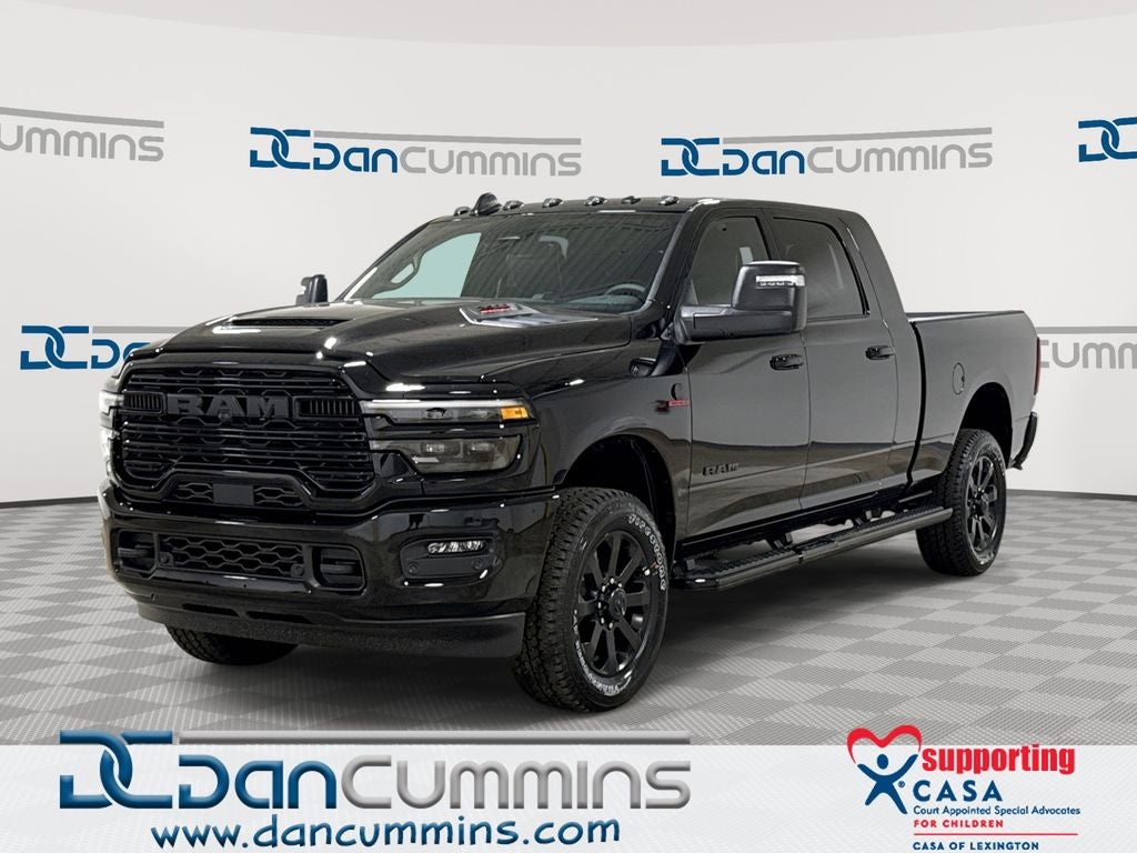 2026 RAM 2500 Laramie in Diamond Black Crystal Pearl-Coat Exterior Paint — front three-quarter view