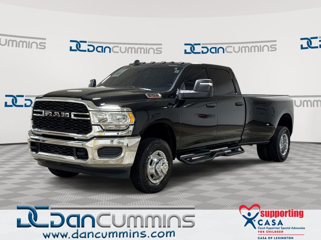 2024 RAM 3500 Tradesman in Diamond Black Crystal Pearlcoat — front three-quarter view