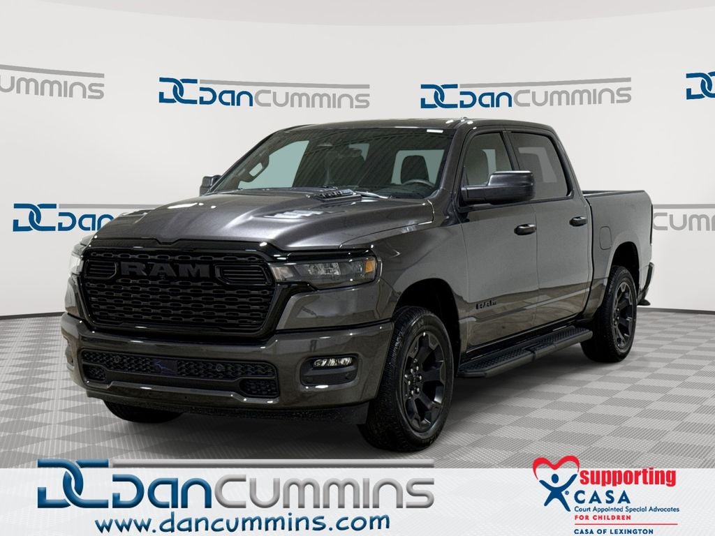 2026 RAM 1500 Express in Granite Crystal Metallic Clear-Coat Exterior Paint — front three-quarter view