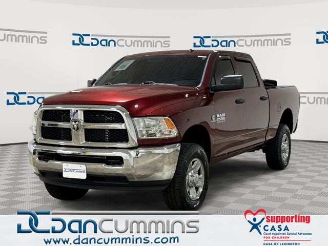 2016 RAM 2500 Tradesman in Delmonico Red Pearlcoat — front three-quarter view