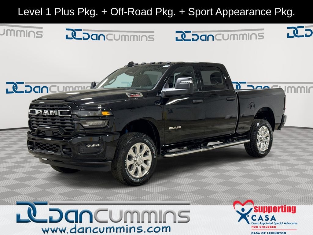 2026 RAM 2500 Big Horn in Diamond Black Crystal Pearl-Coat Exterior Paint — front three-quarter view